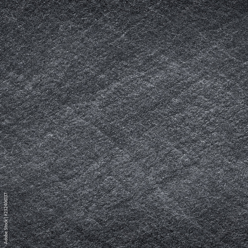 Dark grey black slate background or texture.Dark grey black slate stone abstract background or stone texture.