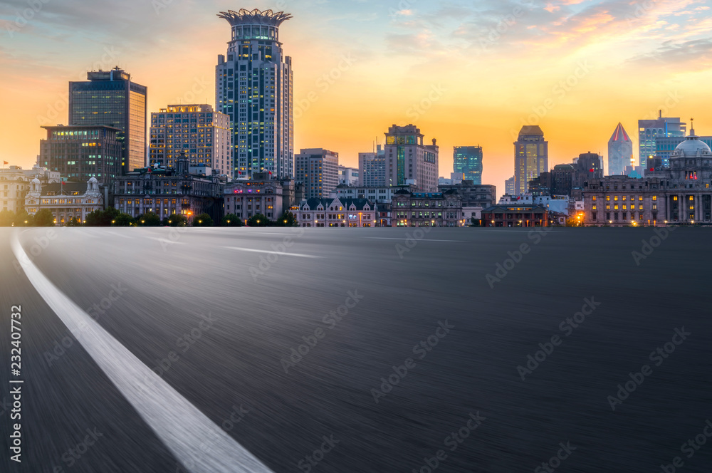 City skyscrapers and road asphalt pavement City skyscrapers and road asphalt pavement