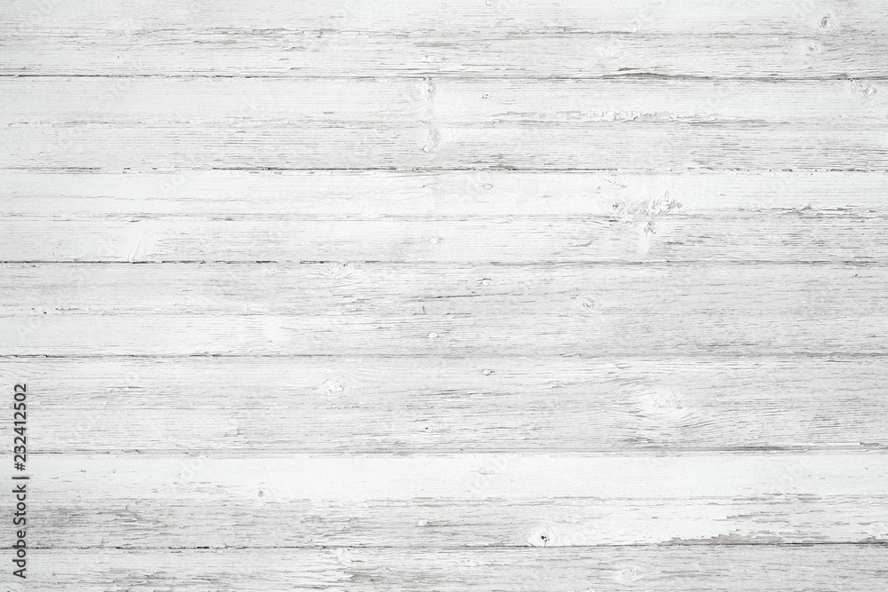Old weathered wood surface with long boards lined up. Wooden planks on a wall or floor with grain and texture. Light neutral flat faded tones. Old weathered wood surface with long boards lined up. Wooden planks on a wall or floor with grain and texture. Light neutral flat faded tones.