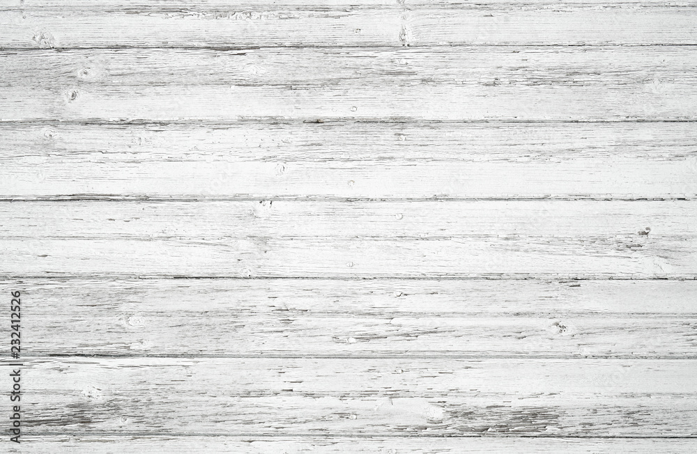 Old weathered wood surface with long boards lined up. Wooden planks on a wall or floor with grain and texture. Light neutral flat faded tones. Old weathered wood surface with long boards lined up. Wooden planks on a wall or floor with grain and texture. Light neutral flat faded tones.