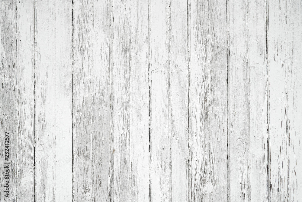 Naklejka premium Old weathered wood surface with long vertical boards. Wooden planks on a wall or floor with grain and texture. Light neutral flat faded tones.