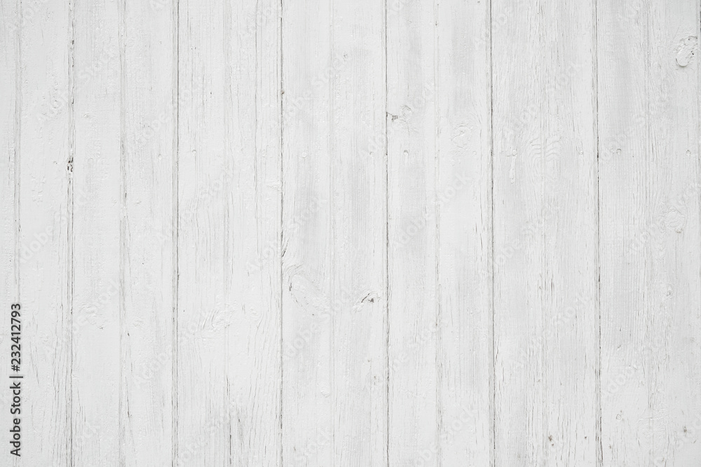 Old weathered wood surface with long vertical boards. Wooden planks on a wall or floor with grain and texture. Light neutral flat faded tones. Old weathered wood surface with long vertical boards. Wooden planks on a wall or floor with grain and texture. Light neutral flat faded tones.