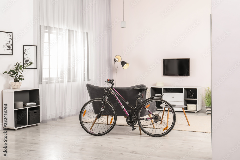 Light living room interior with modern bicycle Light living room interior with modern bicycle