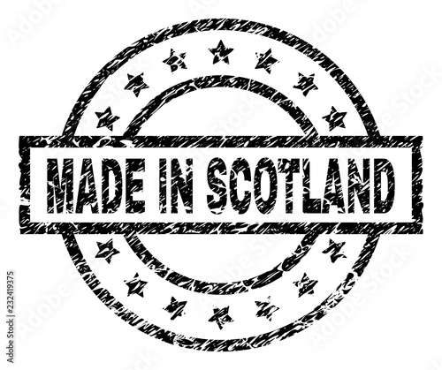 MADE IN SCOTLAND stamp seal watermark with distress style. Designed with rectangle, circles and stars. Black vector rubber print of MADE IN SCOTLAND caption with corroded texture.