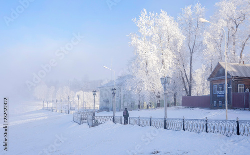 Volga River Embankment in the city of Uglich in the frosty winter afternoon.