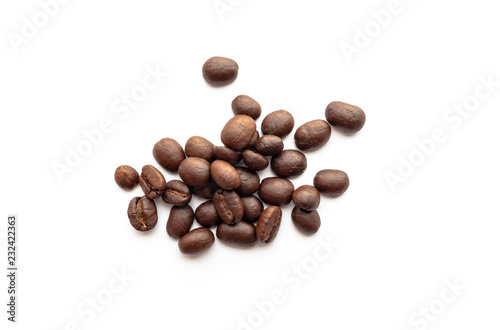 Roasted coffee beans on white background.