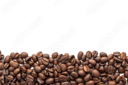 Roasted coffee beans for background with copy space area for text.