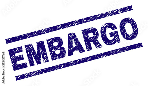 EMBARGO seal print with distress style. Blue vector rubber print of EMBARGO tag with scratched texture. Text tag is placed between parallel lines.