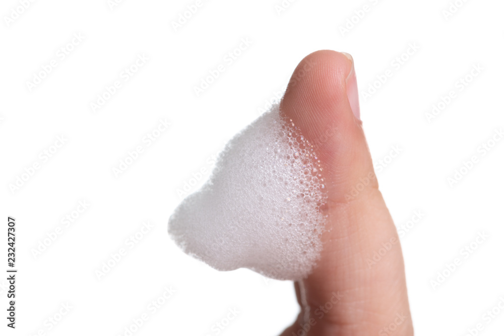 White foam bubbles texture with child finger and hand  isolated on white