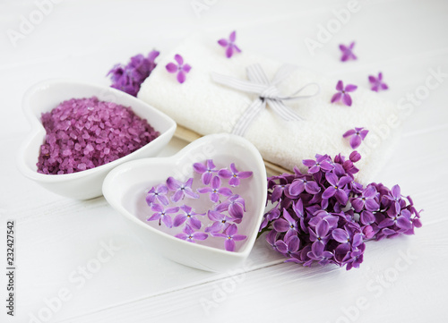 Spa towel and massage products with lilac flowers