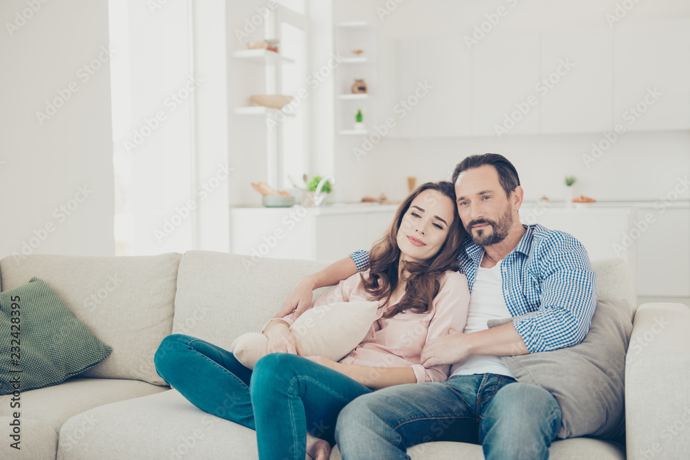 Portrait of her his nice stylish calm spouses sitting on comfort