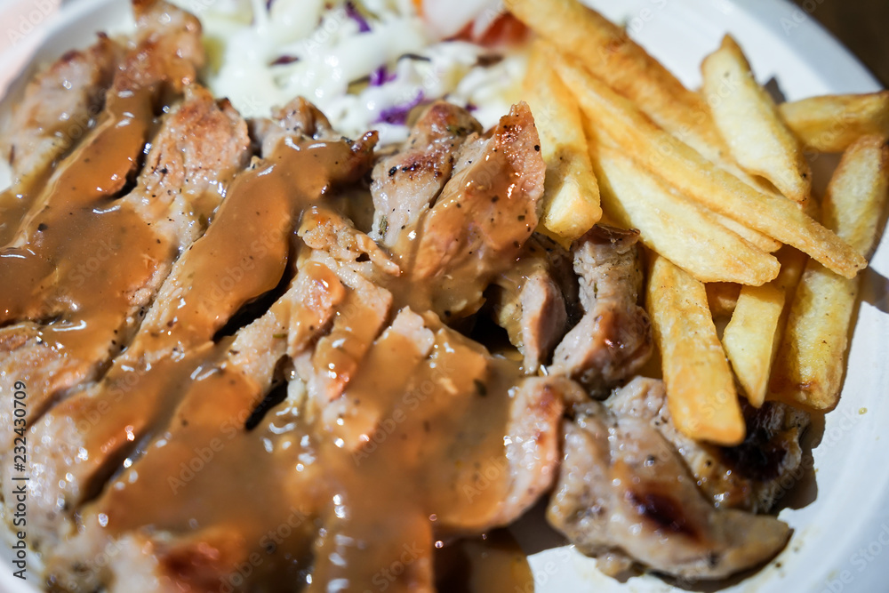 Steak and french fried food street by foodtruck, Bangkok, Thailand. Steak and french fried food street by foodtruck, Bangkok, Thailand.