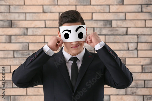 Emotional young businessman...