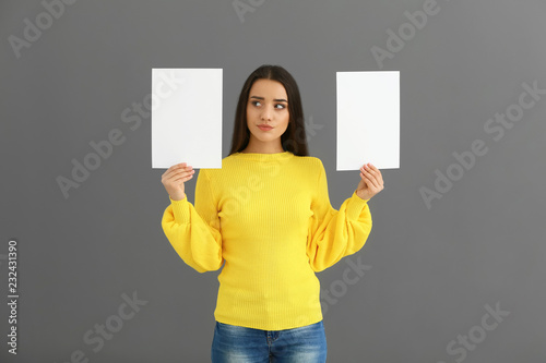 Emotional young woman with ...