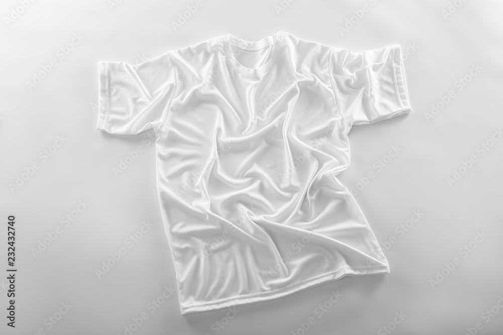 Blank t-shirt on white background Stock Photo | Adobe Stock