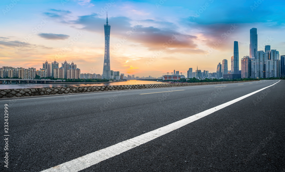 Naklejka premium City skyscrapers and road asphalt pavement