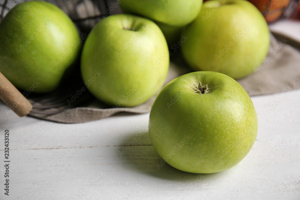Ripe tasty apples on wooden table Ripe tasty apples on wooden table