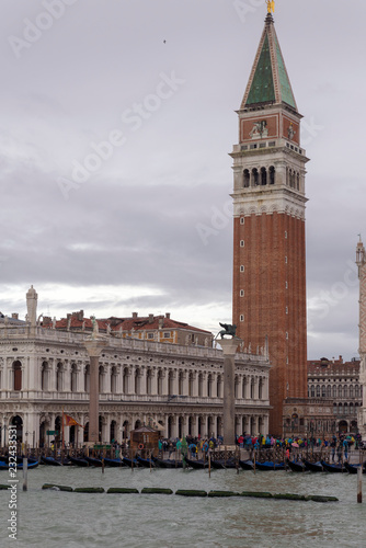VENICE, ITALY- OCTOBER 30, 2018: St Mark's Campanile is the bell tower of St Mark's Basilica in Venice San Marco. It is one of the most recognizable symbols of the city. view from the sea