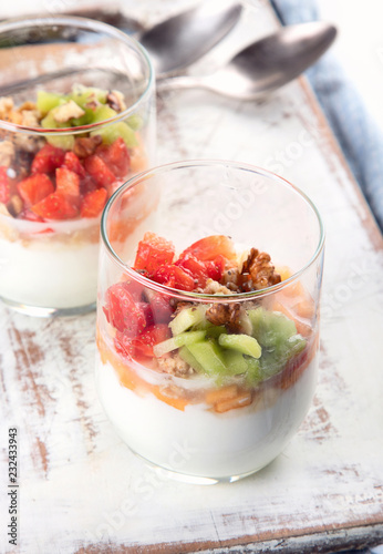 Yogurt in glass with fresh berries