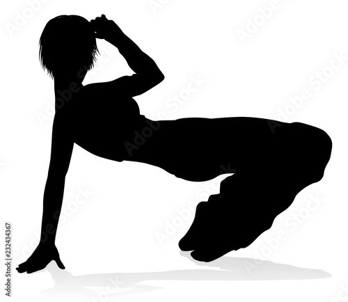 A woman street dance hip hop dancer in silhouette photo