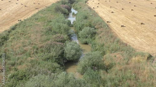 The Biblical Kishon stream and HaAmakim park in northern Israel, where the prophets of Baal and Canaanite army were executed on Elijah's orders. photo