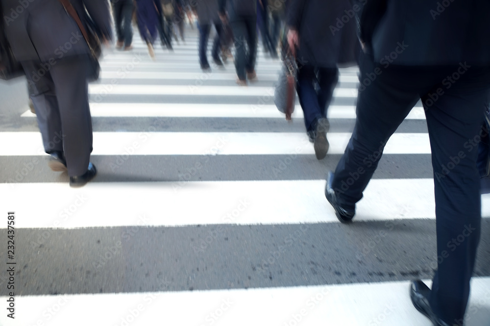 Blurred Motion Business People Crossing Street in City, Hurry Rush Hour in Metropolis Blurred Motion Business People Crossing Street in City, Hurry Rush Hour in Metropolis