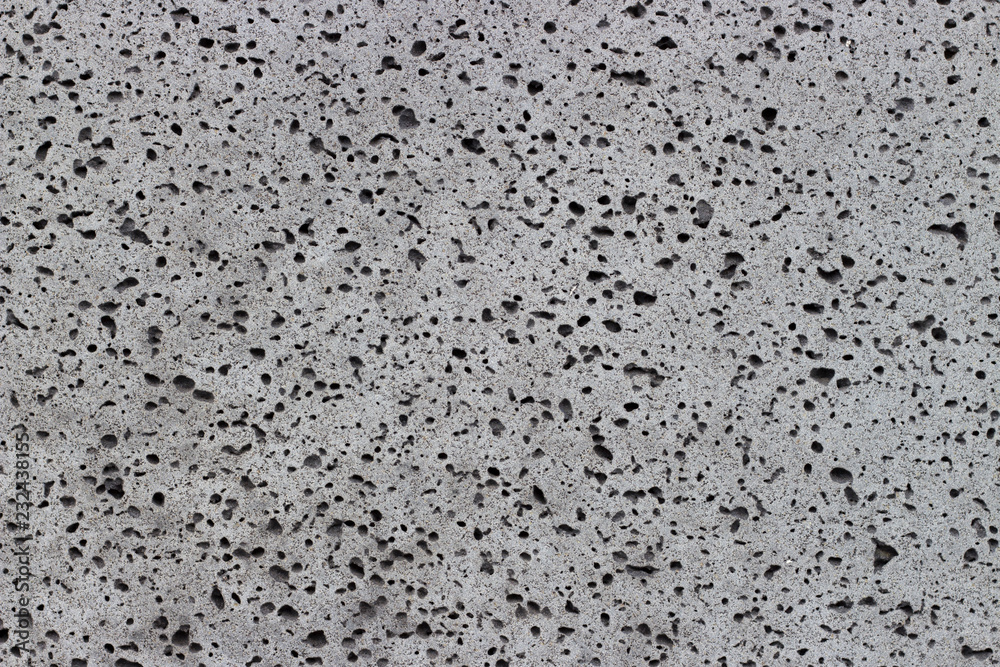 Gray porous foam closeup, texture background