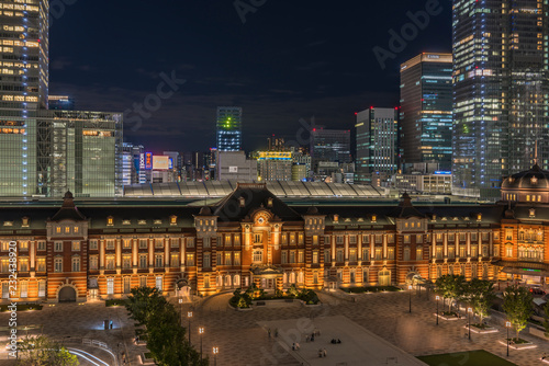 Night view of Marunouchi side of Tokyo railway station in the Chiyoda City, Tokyo, Japan. The station is divided into Marunouchi and Yaesu sides in its directional signage.