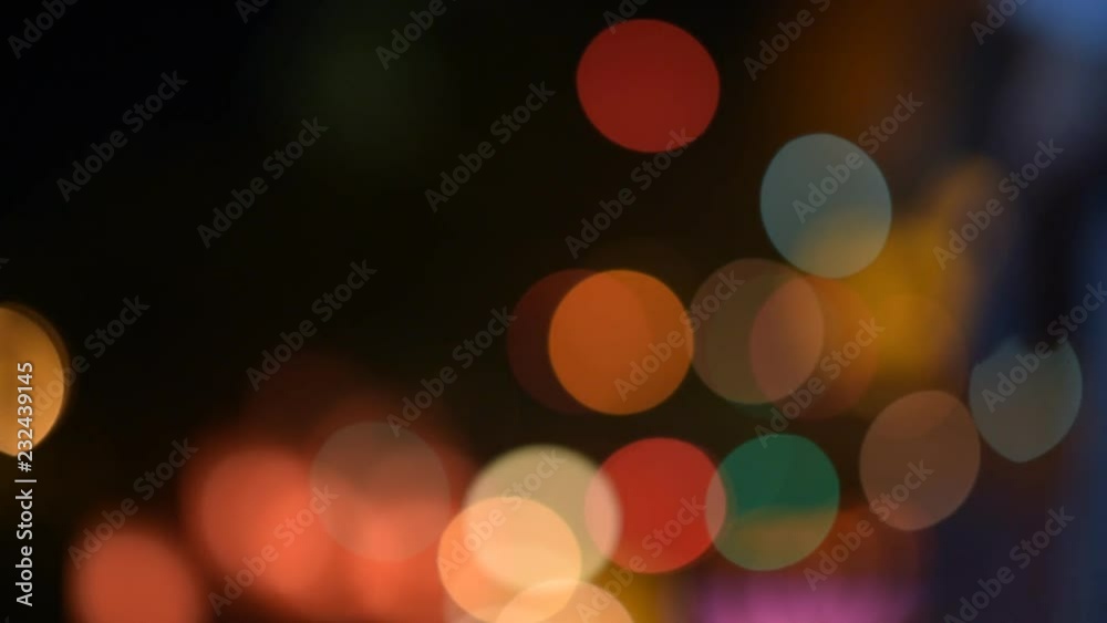 Circles of confusion with blurred silhouettes of people pass by Circles of confusion with blurred silhouettes of people pass by