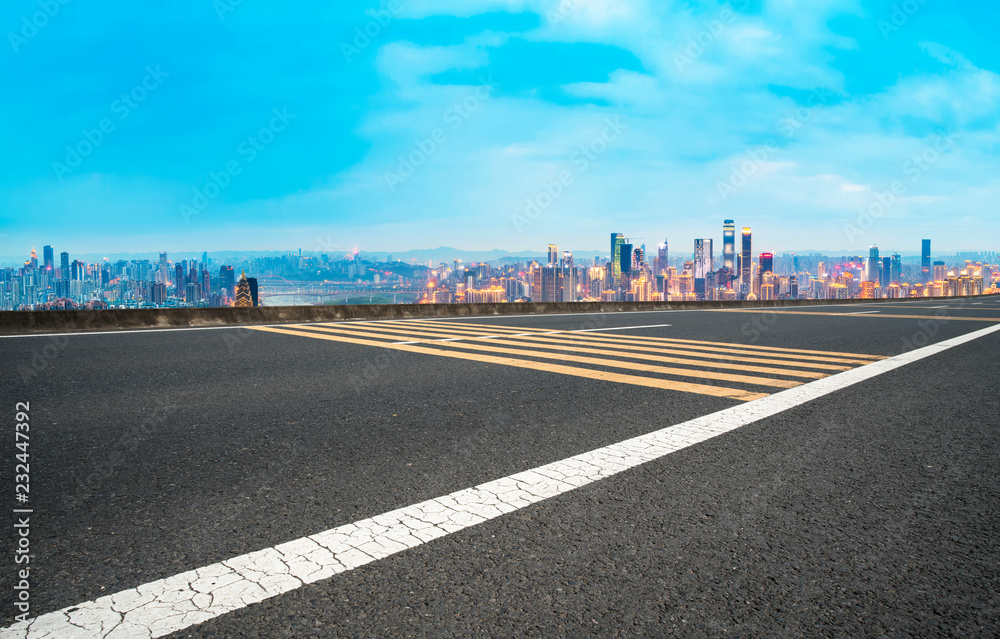 Fototapeta premium City skyscrapers and road asphalt pavement