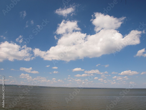 Beautiful sky with clouds over the river. Russian summer nature. Russia, Ural, Perm region
