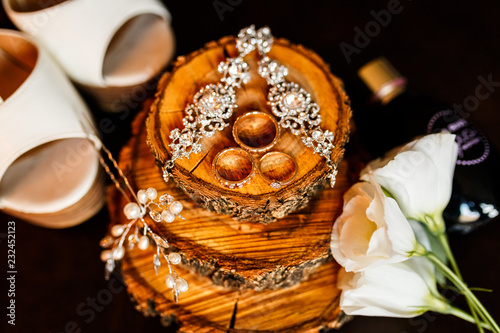 A pair of wedding rings with bokeh background photo