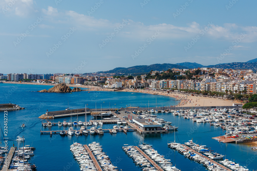 Panoramic aerial view of Blanes in Costa Brava in a beautiful summer day, Spain	
