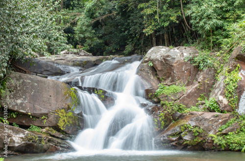 Fototapeta Naklejka Na Ścianę i Meble -  Waterfall flowing from the mountains at Phu SOI DAO waterfall in Loei ,Thailand.