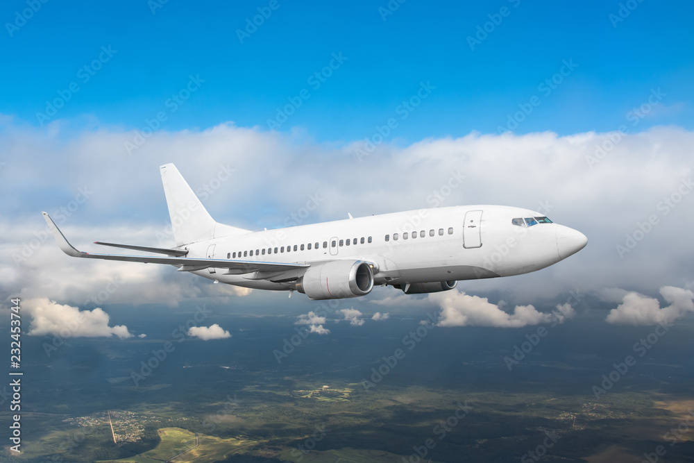 Commercial aircraft flight gaining height in the daytime sky overcast. Commercial aircraft flight gaining height in the daytime sky overcast.