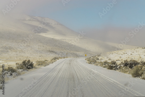 Snowy road through the Steens Mountain  Eastern Oregon  USA