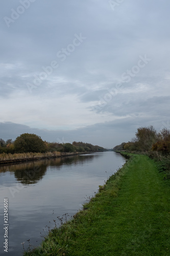 Canal in England on overcast autumn day