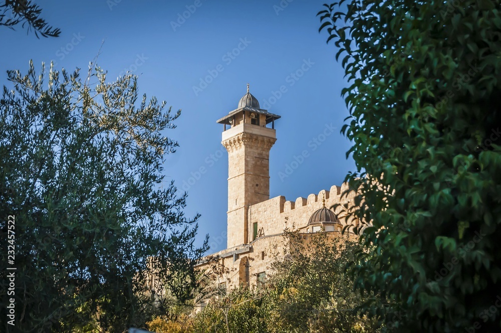 HEBRON, ISRAEL / PALESTINE. September 25, 2018. The exterior view of the Cave of the Patriarchs complex where the Forefathers of the Jewish people and Islam are believed to be buried.