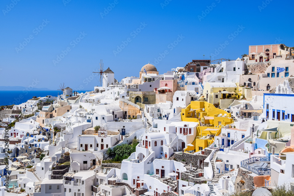 Skyline of Oia with traditional Cyclades architecture on Santorini Island, Greece