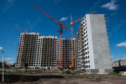 construction site of a high-rise building on a Sunny day