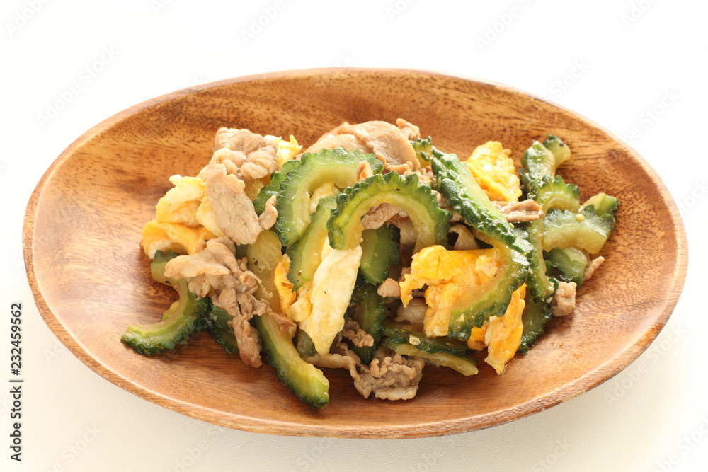 Chinese food, bitter melon and pork stir fried with egg Chinese food, bitter melon and pork stir fried with egg