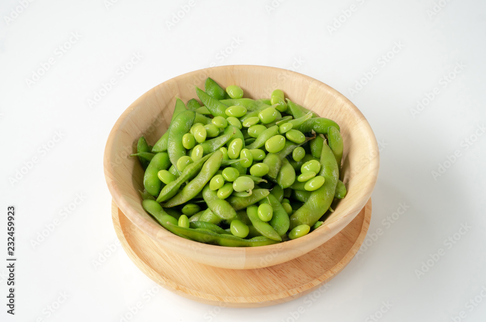 Green soybeans on a wooden bowl Green soybeans on a wooden bowl