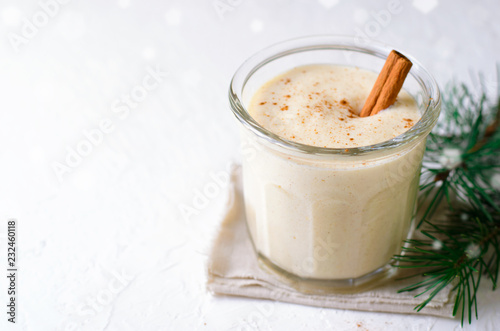 Eggnog, Traditional Christmas Drink, Cocktail with Cinnamon and Nutmeg for Winter Holidays