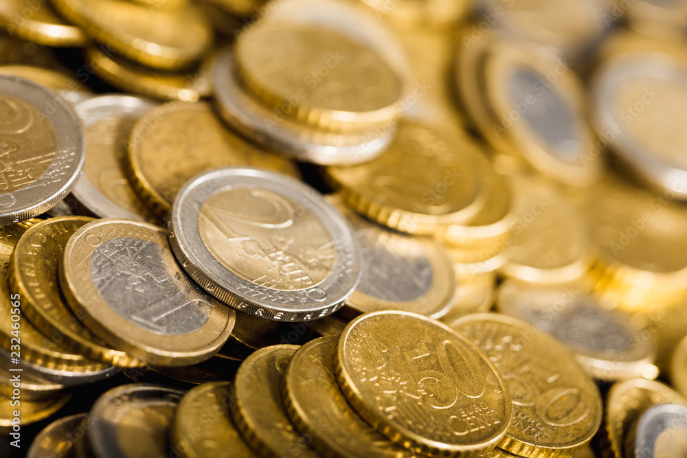Close-up to stacks and heaps of Euro money coins Close-up to stacks and heaps of Euro money coins