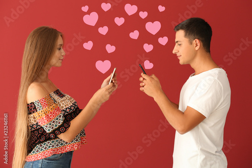 Young couple with mobile ph...