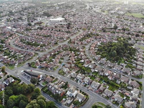 Typical UK Town aerial photo showing rows of houses, roads, parks and communal area photo