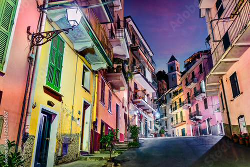 Second city of the Cique Terre sequence of hill cities - Manarola. Colorful spring night in Liguria, Italy, Europe. Traveling concept background. Magnificent Mediterranean cityyscape.