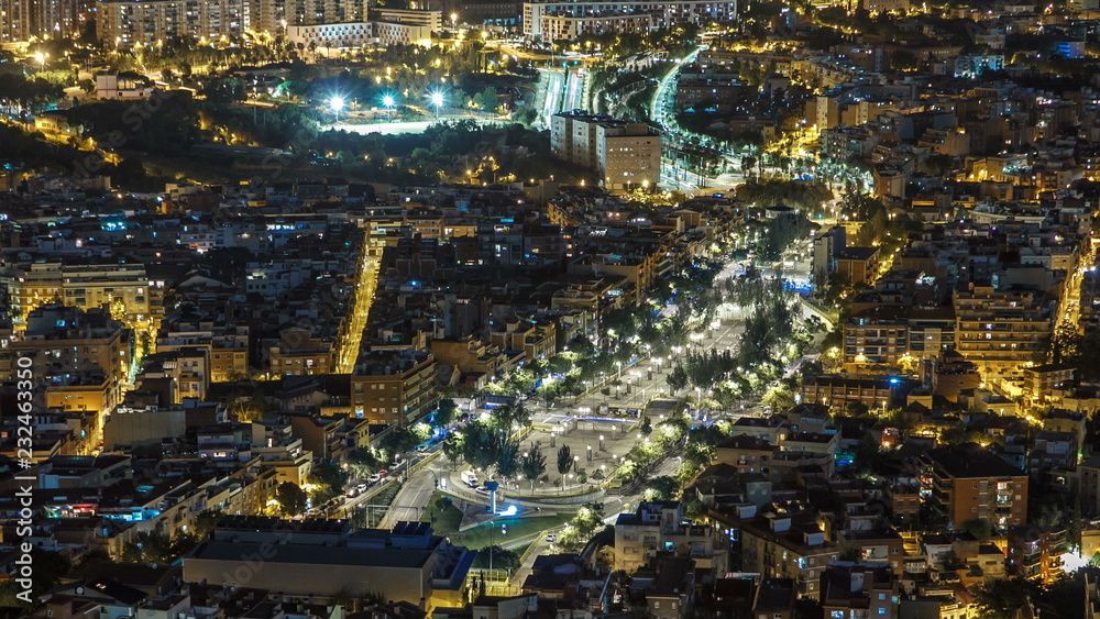 View of Barcelona night timelapse with Square Statute from Bunkers Carmel. Catalonia, Spain.