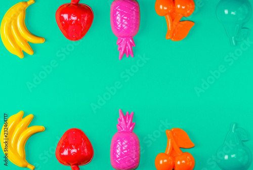 multicolored plastic toys fruits