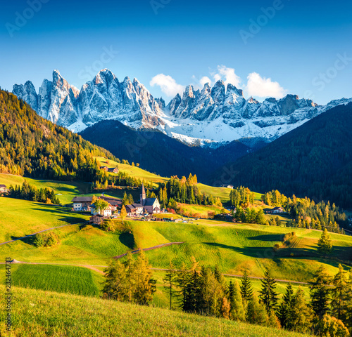 Great morning view of Santa Maddalena village and Chiesa di Santa Maddalena church. Colorful autumn scene of Dolomite Alps, Italy, Europe. Beauty of countryside concept background.